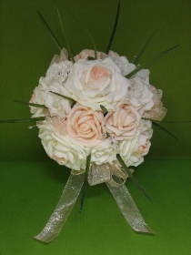 Ivory and pale Peach Brides posy with a single peach rose buttonhole.