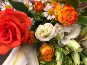 Florist choice seasonal hand tied bouquet orange, white, cream